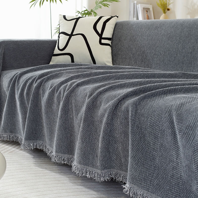 Chenille-Sofaüberwurf mit Fischgrätmuster und Fransen – Grau
