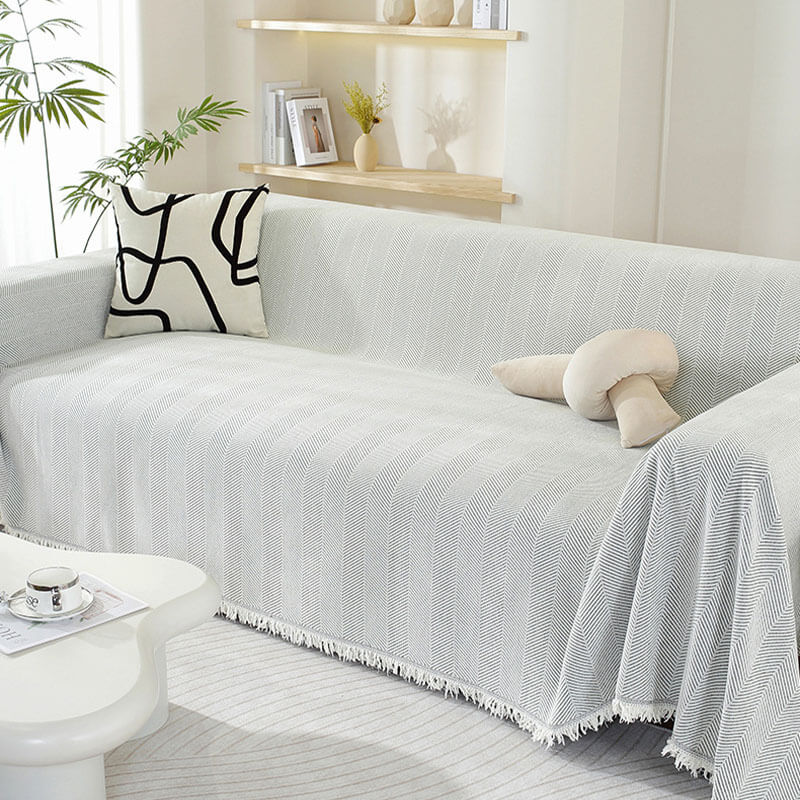 Chenille-Sofaüberwurf mit Fischgrätmuster und Fransen