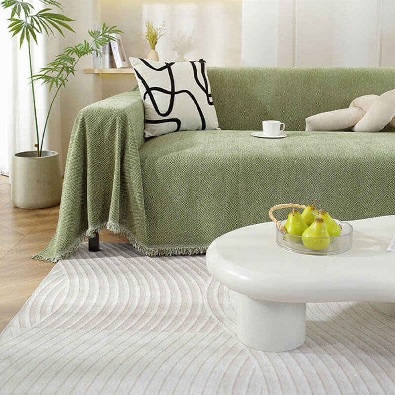 Chenille-Sofaüberwurf mit Fischgrätmuster und Fransen